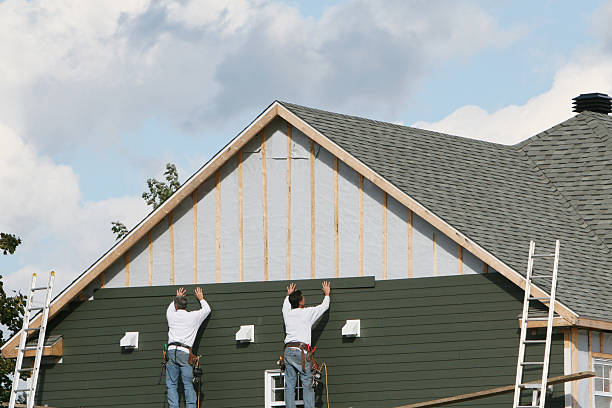 Professional Siding technician working in Reva, VA